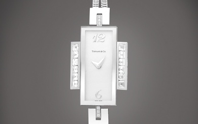 Tiffany & Co. A white gold and diamond-set bracelet watch,...