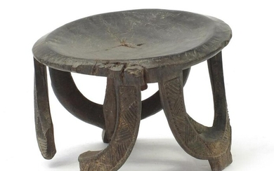 Tribal interest carved hardwood stool, 26.5cm high x