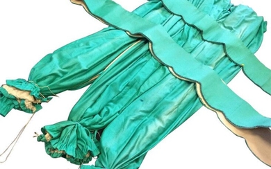 Two pairs of teal coloured lined curtains, with two...