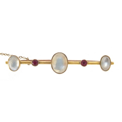 Unmarked gold cabochon moonstone and ruby bar brooch, 5.5cm ...
