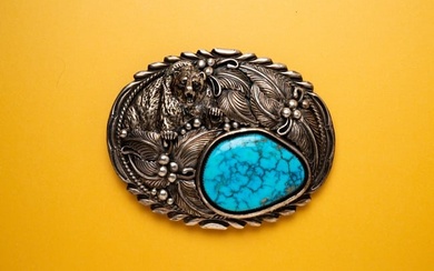 VINTAGE TOM LEWIS STERLING AND TURQUOISE BUCKLE.