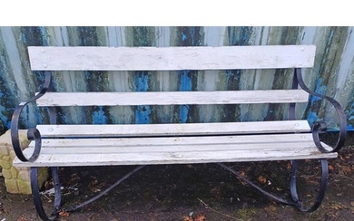 WOODEN GARDEN BENCH WITH PAINTED SHAPED CAST METAL ENDS
