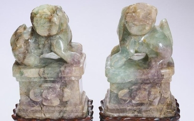 (2) Chinese carved hardstone Fu lions on bases