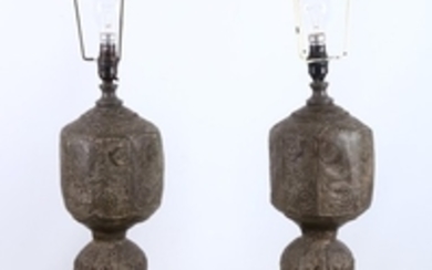 A pair of Islamic style embossed white metal...