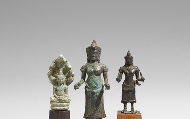 Three small Cambodian Khmer bronze figures. 12th/13th century