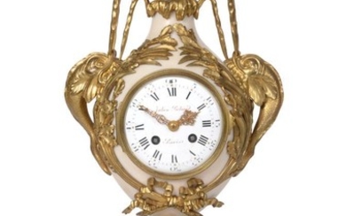 A French Alabaster and Gilt Metal Mounted Striking Mantel Clock,...