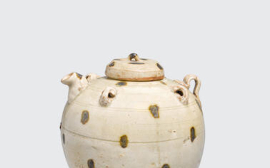 A spotted celadon ewer and lid