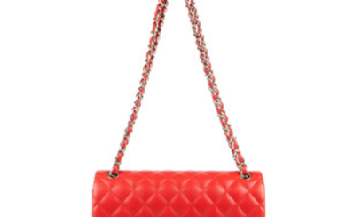 CHANEL - a red Jumbo Classic Double Flap handbag. View more details
