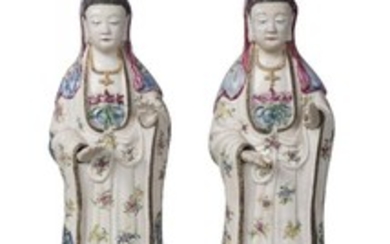 A pair of Chinese porcelain female figures,...