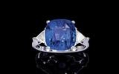 A diamond ring with an untreated sapphire c. 6.02 ct
