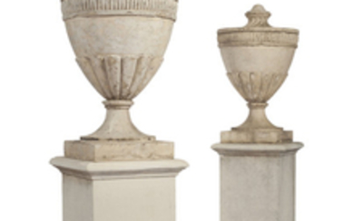 A PAIR OF GEORGE III 'COADE' STONE URNS, DATED 1800