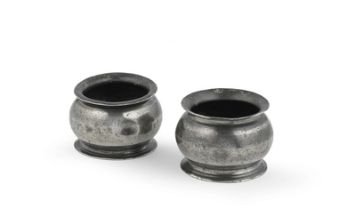 A pair of George III pewter bulbous salts, circa 1800