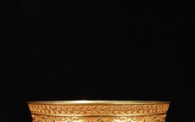 A GILT BRONZE BOWL WITH DRAGONS CARVED