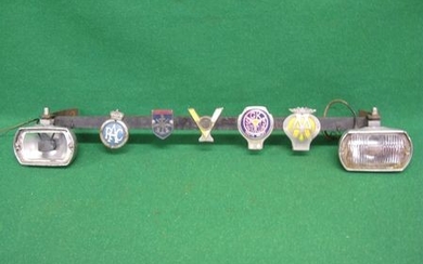 Home-made angle iron badge bar with five badges and two lamps to include: Forces Motoring Club, GK Sports Auto Club - South...