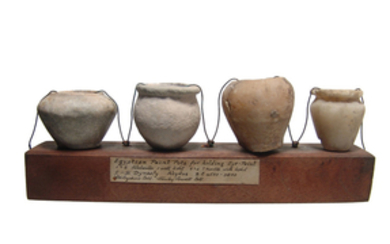 A lovely set of Egyptian stone cosmetic vessels