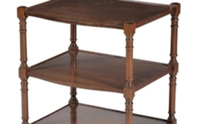 A pair of mahogany three tier side tables