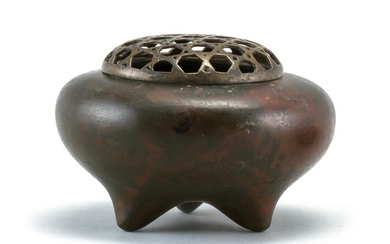 CHINESE BRONZE CENSER In ovoid form, with tripod base. Iron openwork basketry cover. Height 3". Diameter 4".