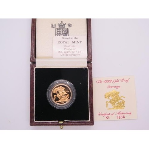 A 1992 proof gold sovereign in case, with certificate, weigh...