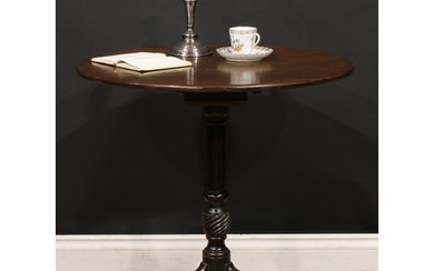 A 19th century mahogany tripod occasional table, one-piece c...