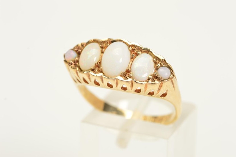 A 9CT GOLD FIVE STONE OPAL RING, designed as a row of five g...