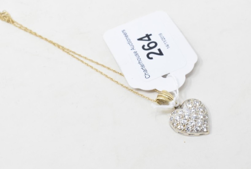 A 9ct gold and diamond heart shaped pendant, on a chain