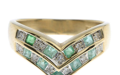A 9ct gold emerald and diamond double chevron ring.