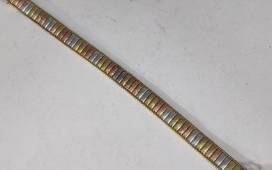 A 9ct gold tri-coloured bracelet with bronze, silver and gol...