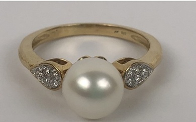 A 9ct yellow gold, cultured pearl and multi-set diamond ring...