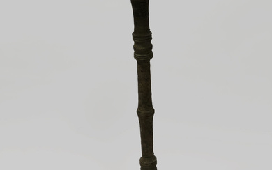 A BRONZE OIL LAMP STAND.