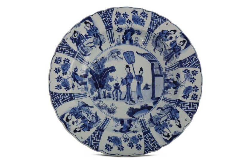 A CHINESE BLUE AND WHITE 'LADIES' DISH.