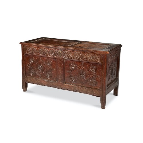 A Charles I oak panelled chest The twin panel front carved w...