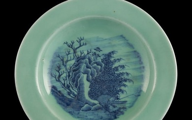 A Chinese celadon-ground blue and white 'landscape' plate, 18th century