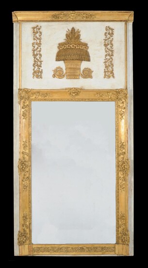 A Continental carved giltwood, composition and cream painted wall mirror