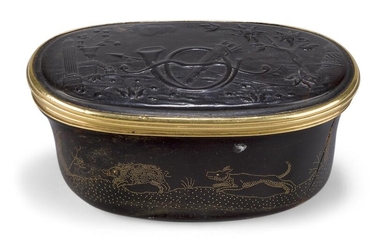 A Continental tortoiseshell and pique work snuff box, early 19th century, of oval form the pressed cover centred by hunting trophies in a landscape, the sides with hunting scenes, 4cm high, 8cm wide, 4.3cm deep