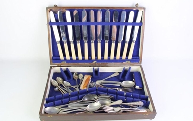 A Cutlery Canteen with Contents Together with Another
