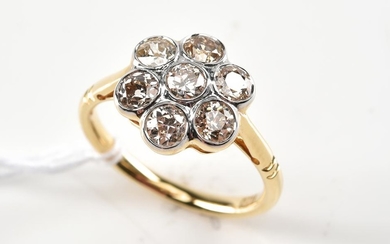A DIAMOND CLUSTER RING IN 18CT GOLD, APPROXIMATE TOTAL DIAMOND WEIGHT 1.55CTS, SIZE L