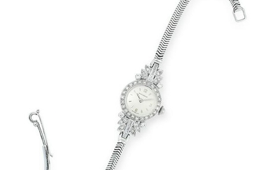 A DIAMOND COCKTAIL WATCH, MOVADO set with baguette and