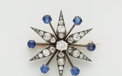 A French Belle Epoque silver 18k gold diamond and sapphire star brooch with detachable mount.