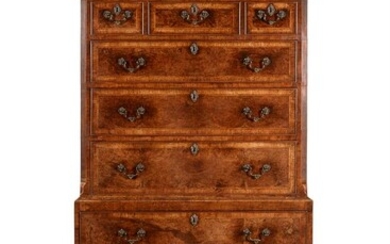 A GEORGE II BURR WALNUT AND FEATHER BANDED CHEST ON CHEST, CIRCA 1735