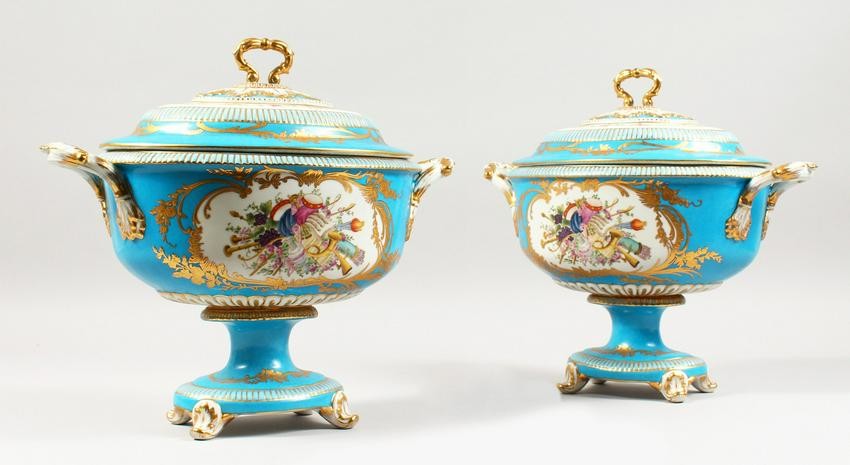 A GOOD PAIR OF SEVRES STYLE TWO HANDLED OVAL TUREENS