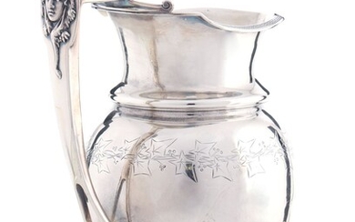 A GORHAM STERLING PITCHER WITH HERCULES MEDALLION