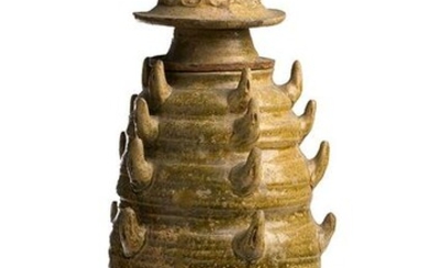 A GREEN-GLAZED URN AND COVER China, Northern Song