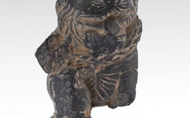 A GREY SCHIST CARVING OF A TIGER, GANDHARA, POSSIBLY 5TH CENTURY