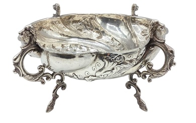 A Georgian sterling silver bowl with cast supports and...