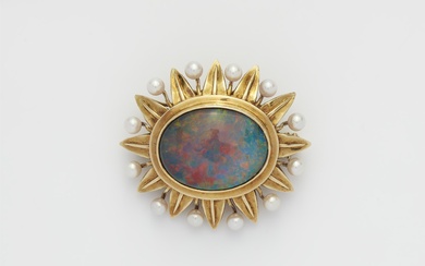 A German 14k gold pearl and opal sunflower brooch.