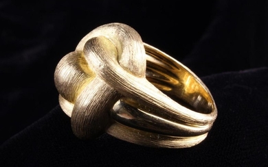 A Henry Dunay 18 Carat Gold Knot Ring with textured & polished strands.
