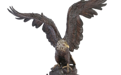 A LARGE BRONZE SULPTURE IN THE FORM OF AN EAGLE