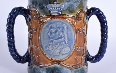 A LARGE ROYAL DOULTON STONEWARE ROPE HANDLED LOVING CUP
