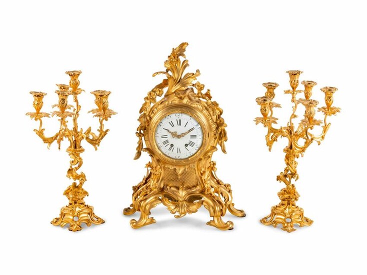 A Louis XV Style Gilt Bronze Clock Garniture