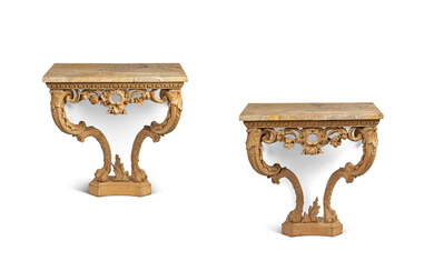 A MATCHED PAIR OF GEORGE II CARVED PINE CONSOLE TABLES...